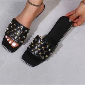 Spiked quilted sandals